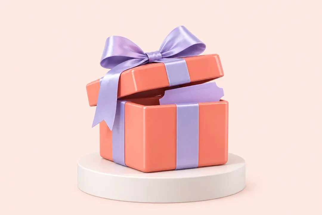 Eine offene Geschenkbox mit Schleife